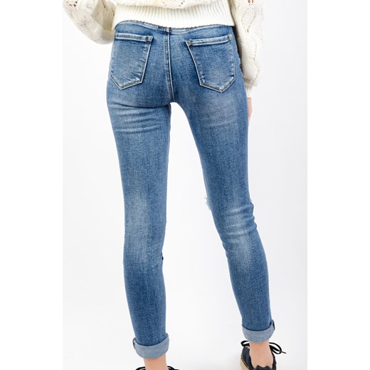 NIEBIESKIE SPODNIE JEANSOWE Z PRZETARCIAMI Olika L okazja olika.com.pl