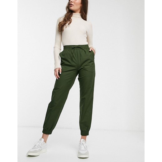 Monki — Zwężane joggersy w kolorze khaki z troczkami-Zielony