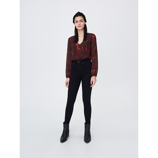 Sinsay - Spodnie jeansowe ECO AWARE - Czarny Sinsay 42