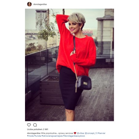 Dorota gardias w czerwonym swetrze