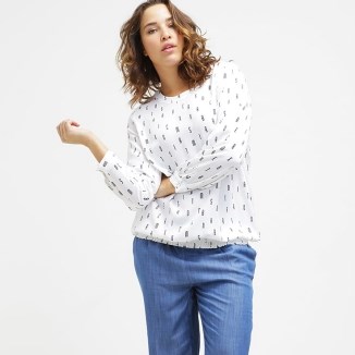 Modne bluzki damskie plus size - zdjęcie produktu