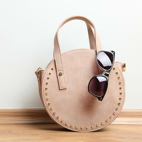 Beżowa okrągła torebka