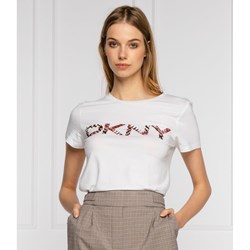 Bluzka damska DKNY biała młodzieżowa  - zdjęcie produktu