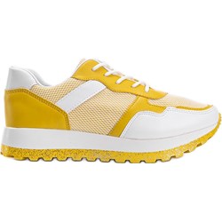 Buty sportowe damskie żółte sneakersy na płaskiej podeszwie sznurowane ze skóry  - zdjęcie produktu