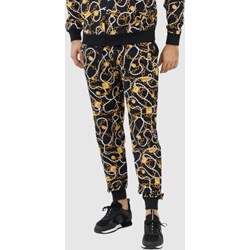 Spodnie męskie Moschino w stylu młodzieżowym z nadrukami  - zdjęcie produktu