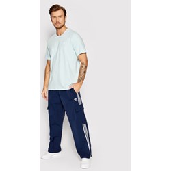 Spodnie męskie Adidas w paski z dresu  - zdjęcie produktu