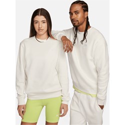 Bluza damska Nike biała tkaninowa jesienna sportowa  - zdjęcie produktu