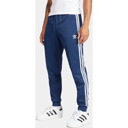 Spodnie męskie niebieskie Adidas w paski sportowe  - zdjęcie produktu