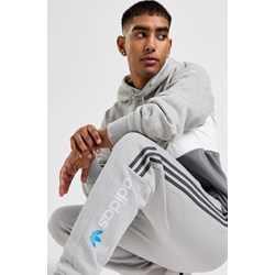 Szare spodnie męskie Adidas sportowe w paski  - zdjęcie produktu
