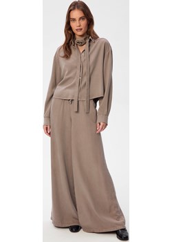 SPODNIE DAMSKIE MYKONOS Z LAMPASEM LIGHT MOCCA WASHED Jemiol - kod rabatowy