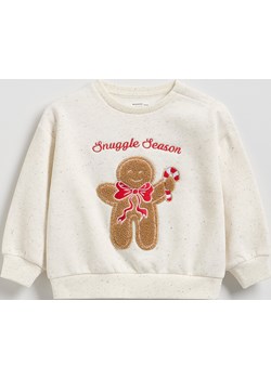 Reserved - Bluza ze świąteczną aplikacją - złamana biel Reserved Reserved - kod rabatowy