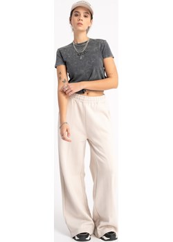 Beżowe spodnie dresowe z szerokimi nogawkami, kolor - beżowy, rozmiar - 140 Young Reporter - kod rabatowy