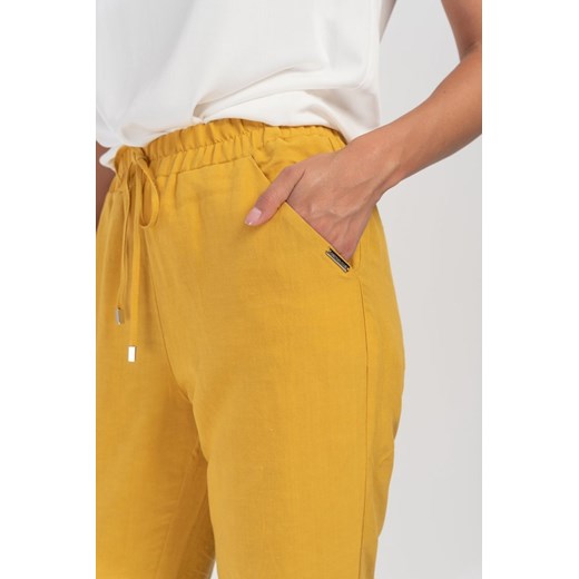 Spodnie z dodatkiem lnu w kolorze żółtym Cotton Club uniwersalny promocyjna cena Cotton Club