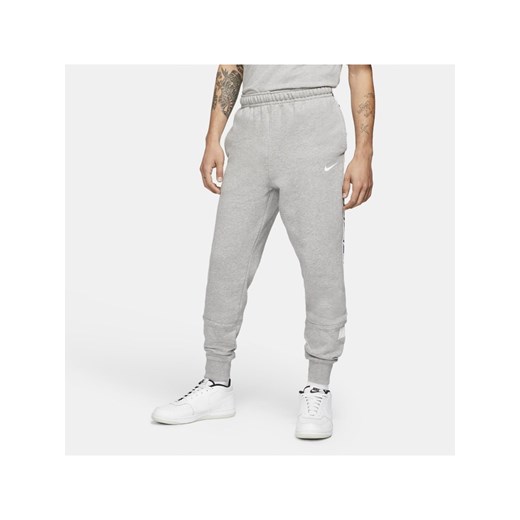 Męskie dzianinowe spodnie typu jogger Nike Sportswear - Szary Nike M Nike poland