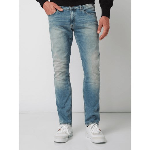 Jeansy w dekatyzowanym stylu o kroju slim fit Tommy Jeans 34/34 Peek&Cloppenburg 