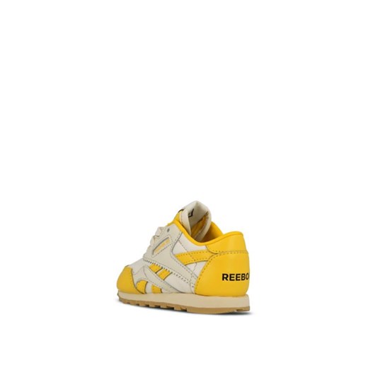 Buty sportowe dziecięce Reebok jesienne żółte sznurowane ze skóry 
