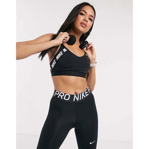 Nike Training – Indy – Czarny biustonosz sportowy zapewniający lekkie wsparcie z ozdobną taśmą z logo Nike Training XL Asos Poland