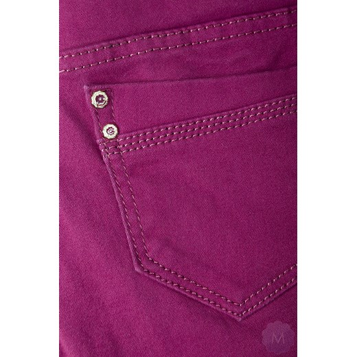 Spodnie jeansowe rurki kolor buraczkowy z wyższym stanem mercerie-pl czerwony Spodnie