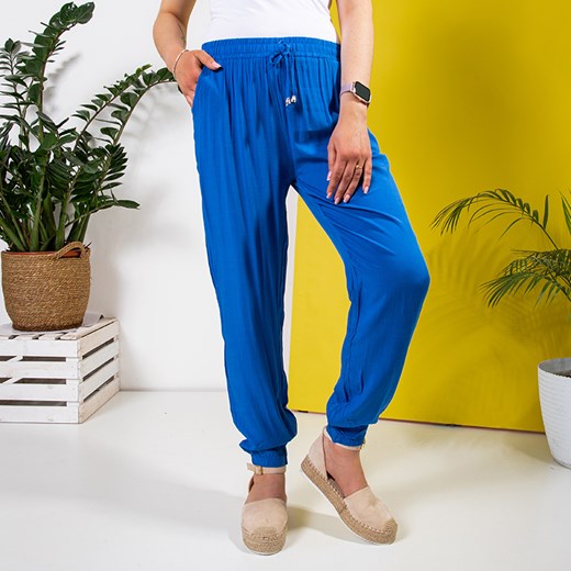 Niebieskie damskie materiałowe spodnie PLUS SIZE - Odzież Royalfashion.pl 5XL/6XL royalfashion.pl
