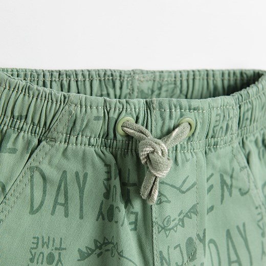 Cool Club, Spodnie materiałowe chłopięce, zielone, napisy Cool Club 134 smyk