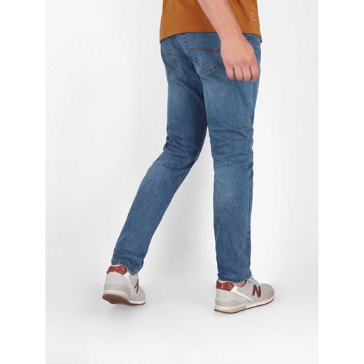 Niebieskie dopasowane jeansy męskie D-DEXTER 30 W32 L32 Volcano.pl