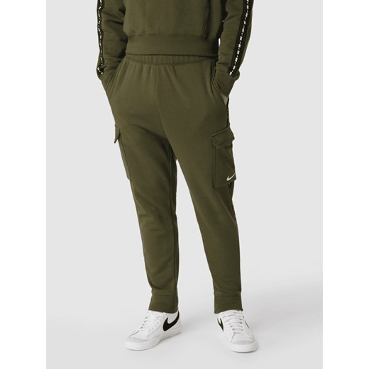 Spodnie dresowe z kieszeniami cargo Nike S Peek&Cloppenburg 