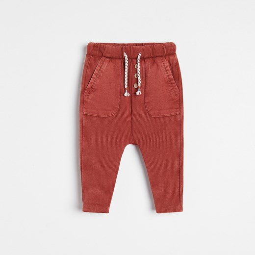 Reserved - Bawełniane spodnie z kieszeniami - Czerwony Reserved 86 wyprzedaż Reserved