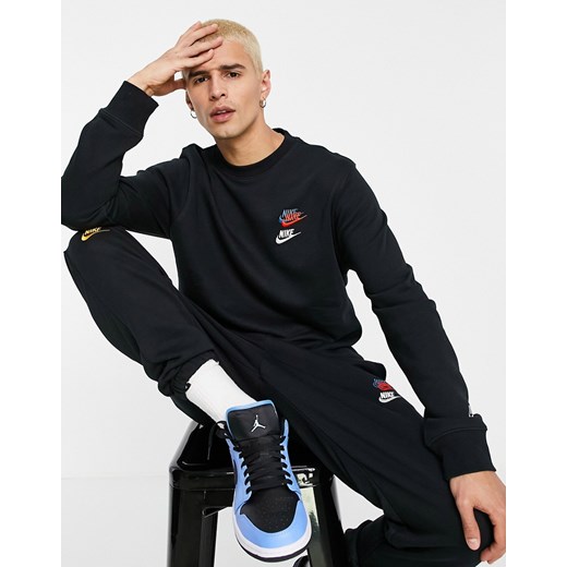 Nike Essential – Czarna dzianinowa bluza z okrągłym dekoltem i kolorowym logo-Black Nike 112 - 124 CM Asos Poland