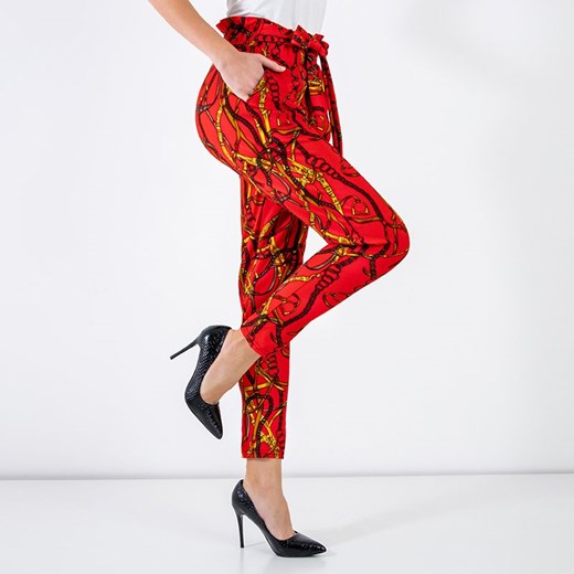 Czerwone damskie spodnie z printem - Odzież Royalfashion.pl XL/XXL - 43 royalfashion.pl