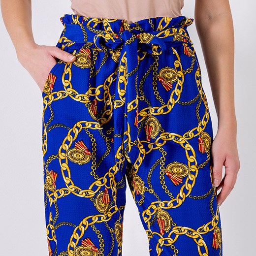 Kobaltowe damskie spodnie z printem - Odzież Royalfashion.pl S/M - 37 royalfashion.pl