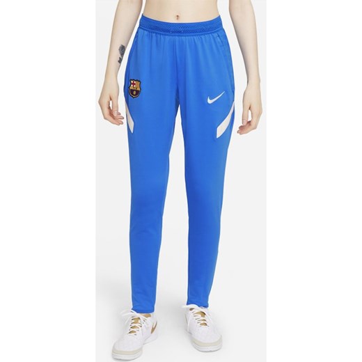 Damskie spodnie piłkarskie Nike Dri-FIT FC Barcelona Strike - Niebieski ze sklepu Nike poland w kategorii Spodnie damskie - zdjęcie 126292097