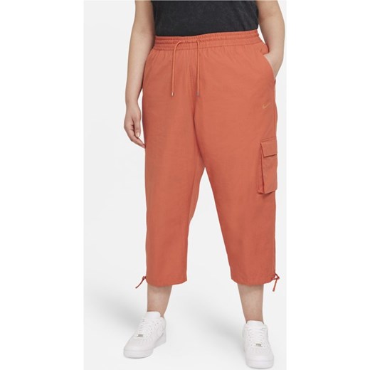 Pomarańczowe spodnie damskie Nike 