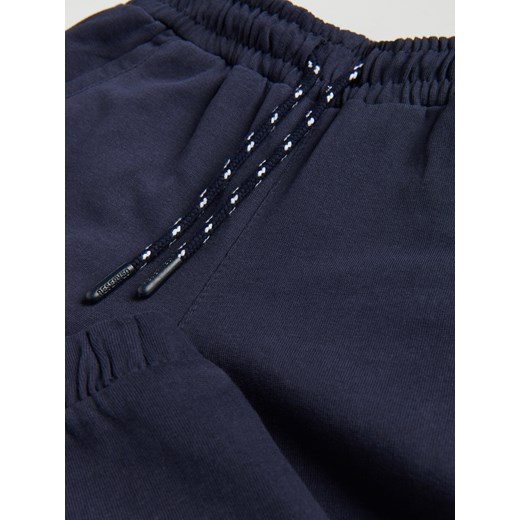 Reserved - Dresowe spodnie z kieszeniami - Granatowy Reserved 128 Reserved