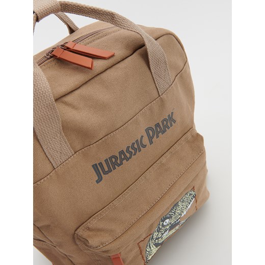 Reserved - Płócienny plecak Jurassic Park - Beżowy Reserved ONE SIZE Reserved promocja