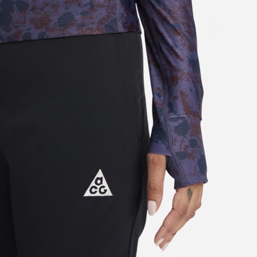 Bluzka damska Nike z długimi rękawami w abstrakcyjnym wzorze z okrągłym dekoltem 