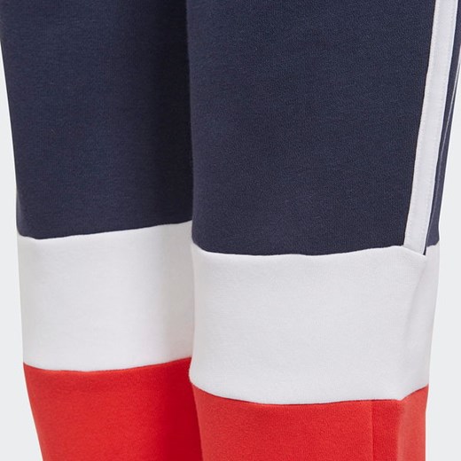 Spodnie dresowe młodzieżowe Essentials Colorblock Joggers Adidas 176cm wyprzedaż SPORT-SHOP.pl