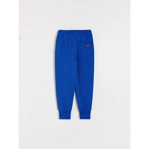 Reserved - Dresowe spodnie z kieszeniami - Niebieski Reserved 164 Reserved