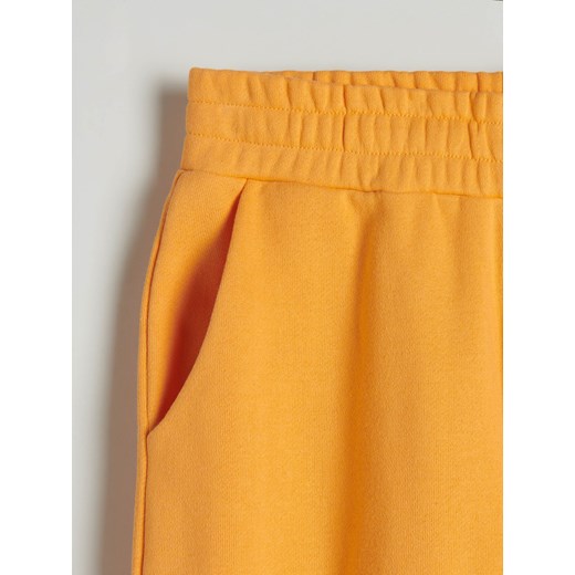 Reserved - Spodnie z dresowej dzianiny - Pomarańczowy Reserved XS Reserved