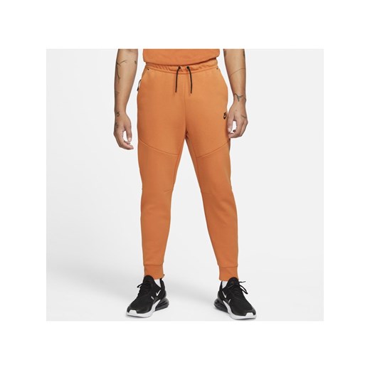Joggery męskie Nike Sportswear Tech Fleece - Pomarańczowy Nike S wyprzedaż Nike poland