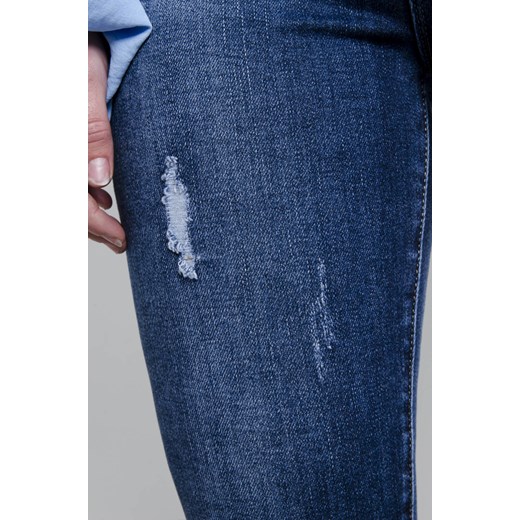 SPODNIE JEANSOWE CIEMNE Z PRZETARCIAMI- PUSH UP Olika M olika.com.pl