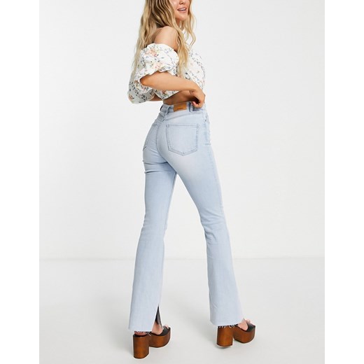 Stradivarius – Jasnoniebieskie elastyczne jeansy dzwony z rozcięciami 40 Asos Poland