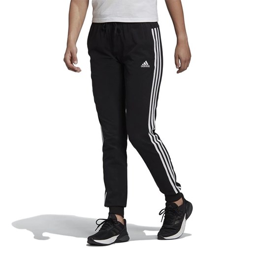 Spodnie dresowe adidas Essentials Single Jersey 3-Stripes Pants GM5542 - czarne ze sklepu streetstyle24.pl w kategorii Spodnie damskie - zdjęcie 133660947