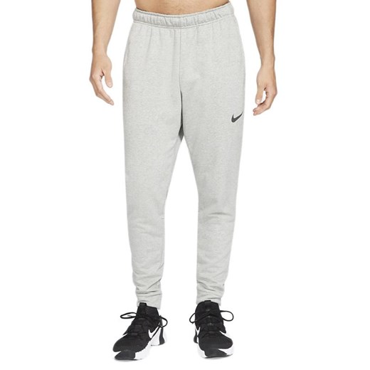 Spodnie Nike Dri-Fit CZ6379-063 - szare ze sklepu streetstyle24.pl w kategorii Spodnie męskie - zdjęcie 133664887