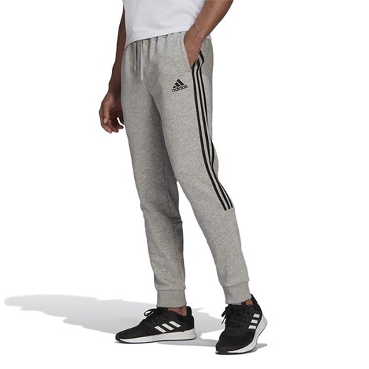 Spodnie dresowe adidas Essentials Fleece Tapered Cuff 3-Stripes Pants GK8976 - XL wyprzedaż streetstyle24.pl