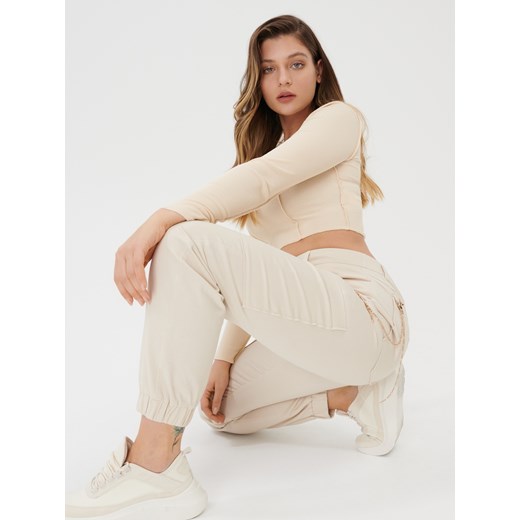 Sinsay - Spodnie jogger z łańcuszkiem - Kremowy Sinsay XS Sinsay