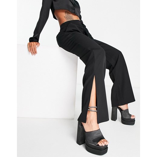 Stradivarius – Czarne dopasowane spodnie z rozcięciem na dole-Black 42 Asos Poland