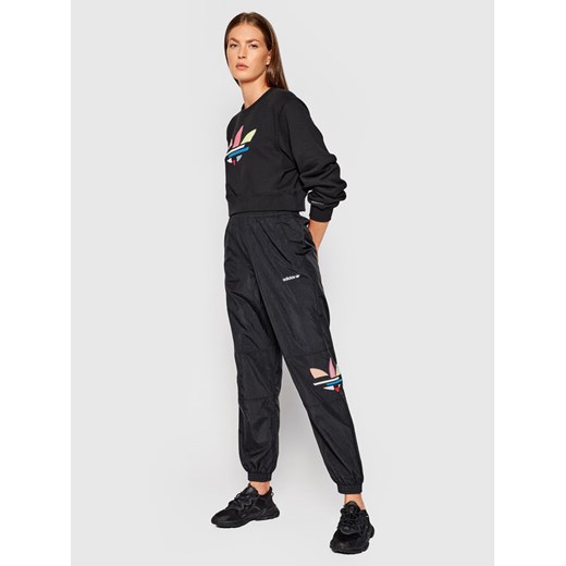 adidas Spodnie dresowe adicolor Shattered Trefoil H22863 Czarny Relaxed Fit 34 promocyjna cena MODIVO