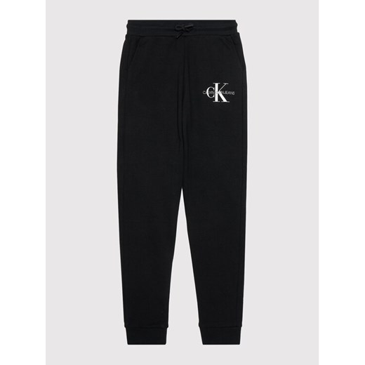 Calvin Klein Jeans Spodnie dresowe Monogram Logo IB0IB00944 Czarny Regular Fit 10Y promocja MODIVO