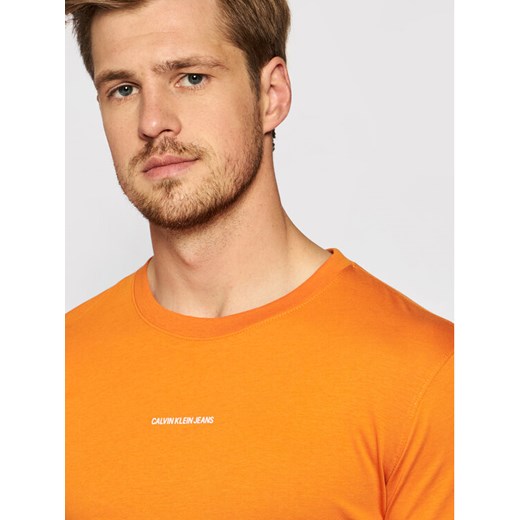 Calvin Klein Jeans T-Shirt J30J318067 Pomarańczowy Slim Fit XL wyprzedaż MODIVO