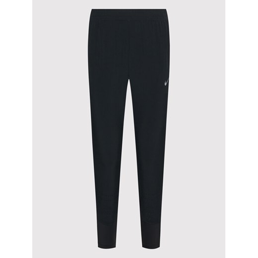 Nike Spodnie dresowe Swift CZ1115 Czarny Slim Fit Nike M MODIVO